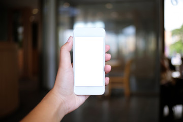 Close up of women's hands holding cell telephone blank copy space screen. smart phone with technology concept