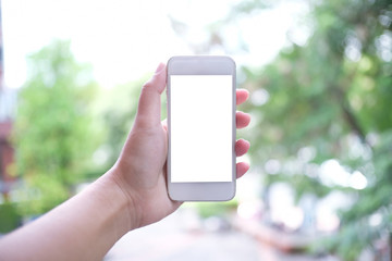 Close up of women's hands holding cell telephone blank copy space screen. smart phone with technology concept