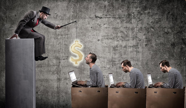 A greedy businessman motivates office workers with a salary. Office slavery concept.
