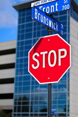 Stop sign cross roads
