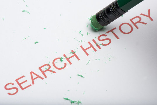 Pencil Erasing the Word 'Search History' on Paper