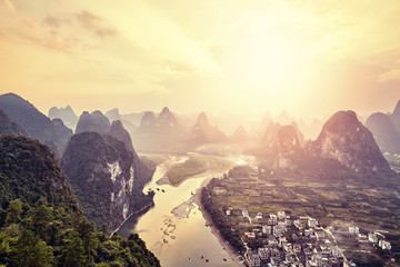 Lijiang River at sunset seen from Xingping village viewpoint, located 63 km from Guilin and 25 km...