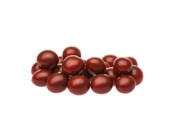 A pile of dark cherry tomatoes