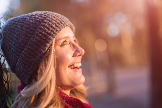 Woman portrait at sunset in autumn in Verona