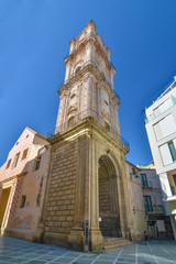 Facade of San Juan church in Malaga, Spain on a sunny day.