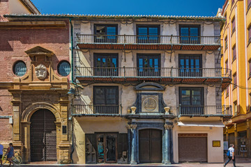 Fototapeta na wymiar Facade of the Sociedad econÃ³mica amigos del paÃs building (Casa del Consulado) in Malaga, Spain on a sunny day.