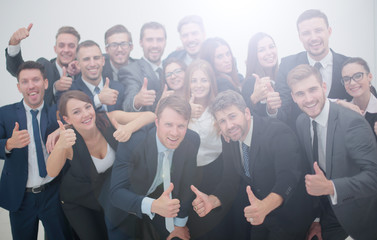 Fototapeta na wymiar Group of jubilant business people jumping for joy and shouting i