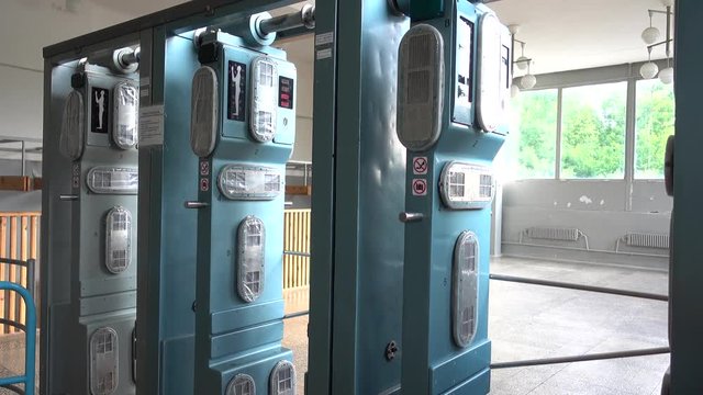 Chernobyl, Ukraine - 17th of June 2017: Visit to Chernobyl - 4K Man door radiation dose detectors in one of Chernobyl buildings