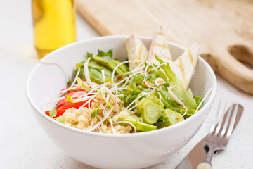 Buddha bowl of quinoa, tofu and vegetables.