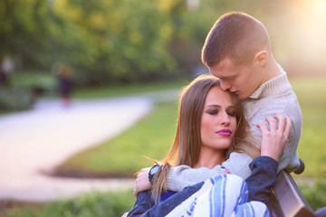 Young love couple in park