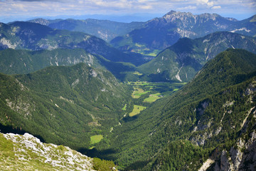 Fototapeta na wymiar View from Pokljuka mountain on neighborhood mountains, Slovenia