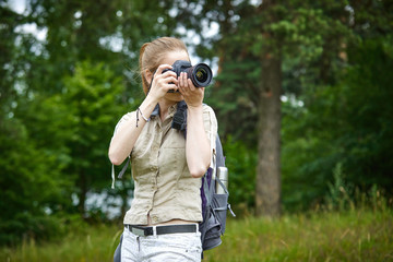 young woman with camera