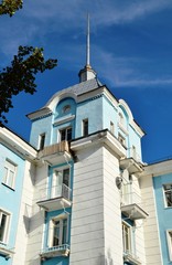 Monchegorsk, Russia. House with a spire of Stalinist buildings on Metallurgists Avenue, Leningrad style of spire style. Fragment
