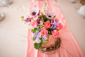 Table decoration made of vase with beautiful flowers