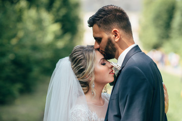 A beautiful couple of brides walking outside