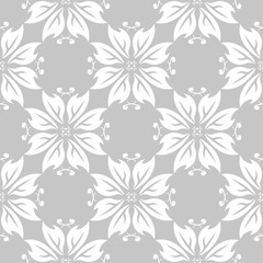Gray and white floral ornament. Seamless pattern for textile and wallpapers