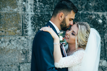 A beautiful couple of brides walking outside