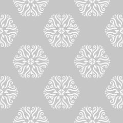 White floral design on gray background. Seamless pattern for textile and wallpapers