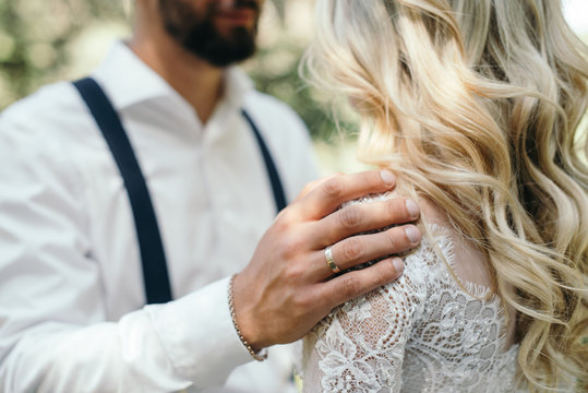 A beautiful couple of brides walking outside