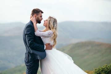 A beautiful couple of brides walking outside