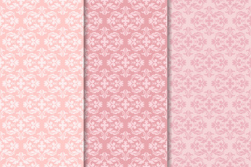 Set of floral ornaments. Pale pink vertical seamless patterns. Wallpaper backgrounds