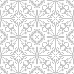 White flowers on gray background. Ornamental seamless pattern for textile and wallpapers