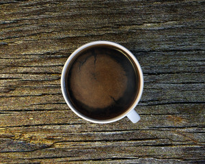 The white cup of black brewed coffee on wooden table. 3D render.