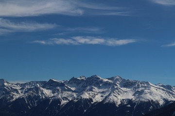 Fototapeta na wymiar Blue sky of a sunny winter day in the mountains near Mals (Bozen, Italy)