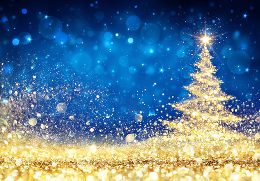 Shiny Christmas Tree - Golden Dust Glittering In The Blue Background