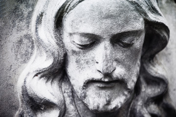 Fototapeta na wymiar fragment of antique statue Jesus Christ as a symbol of love, faith and religion.