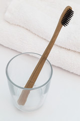 Wooden Toothbrush in a Glass