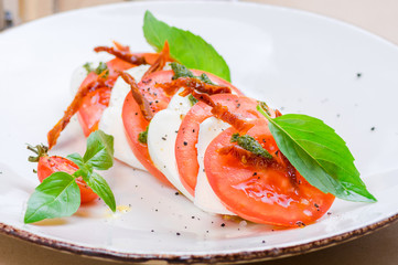 Caprese salad or Buffalo mozzarella with tomatoes