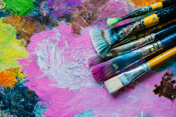 Artist brushes on canvas