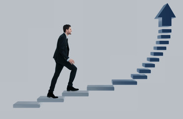 Businessman up the staircase over white background. ready for your design