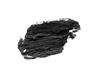 Black volcanic cosmetic clay texture close up. solution of cosmetic clay abstract background.