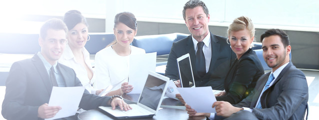 Group of successful business people looking confident