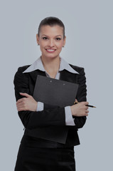 Young  business woman holding a folder.