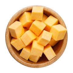 Wooden bowl with diced pumpkin isolated on white background.