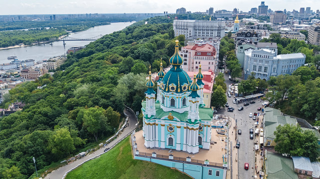 Aerial top view of Saint Andrew's church and Andreevska street from above, cityscape of Podol district, city of Kiev (Kyiv), Ukraine
