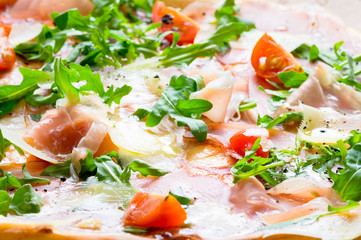 Italian prosciutto and rucola pizza.