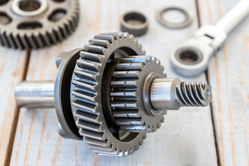  Gear wheels on a old wooden table