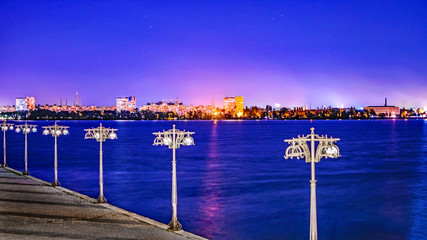 Background A embankment in the city Dnipro at night time. The Dnieper River. Selective focus. Dnepropetrovsk, Dnipropetrovsk, Dnepr, Ukraine.