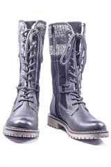 Woman's suede winter boots isolated on white