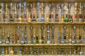 Shelves with hookahs in an oriental shop.
