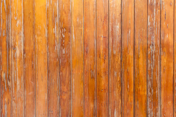 Wood wall background made with vertical planks of old wood.