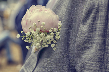Close up of peony corsage