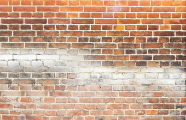 red old brick wall with graffiti divorces