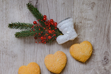 Christmas cookies , fir branch, and santa boot