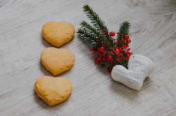 Christmas cookies , fir branch, and santa boot