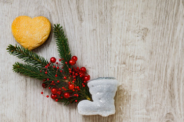 Christmas cookies , fir branch, and santa boot
